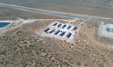 An overview of a mining farm with many machines.